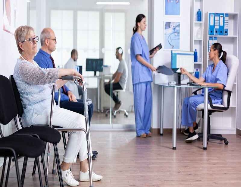 Senior women walking and patients are sitting.